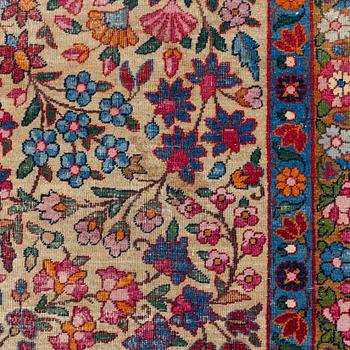 An antique 'Millefleur' Kerman Laver carpet, ca 434 x 321 cm.