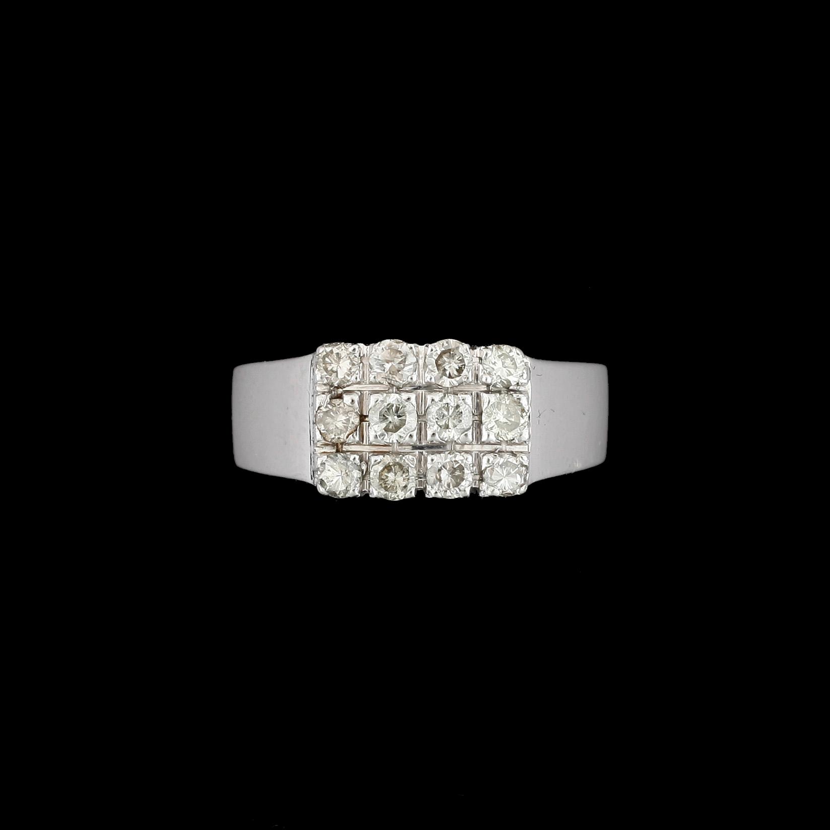 RING, 18k vitguld med 12 briljantslipade diamanter tot ca 0,36ct. Vikt ca 5,3g.