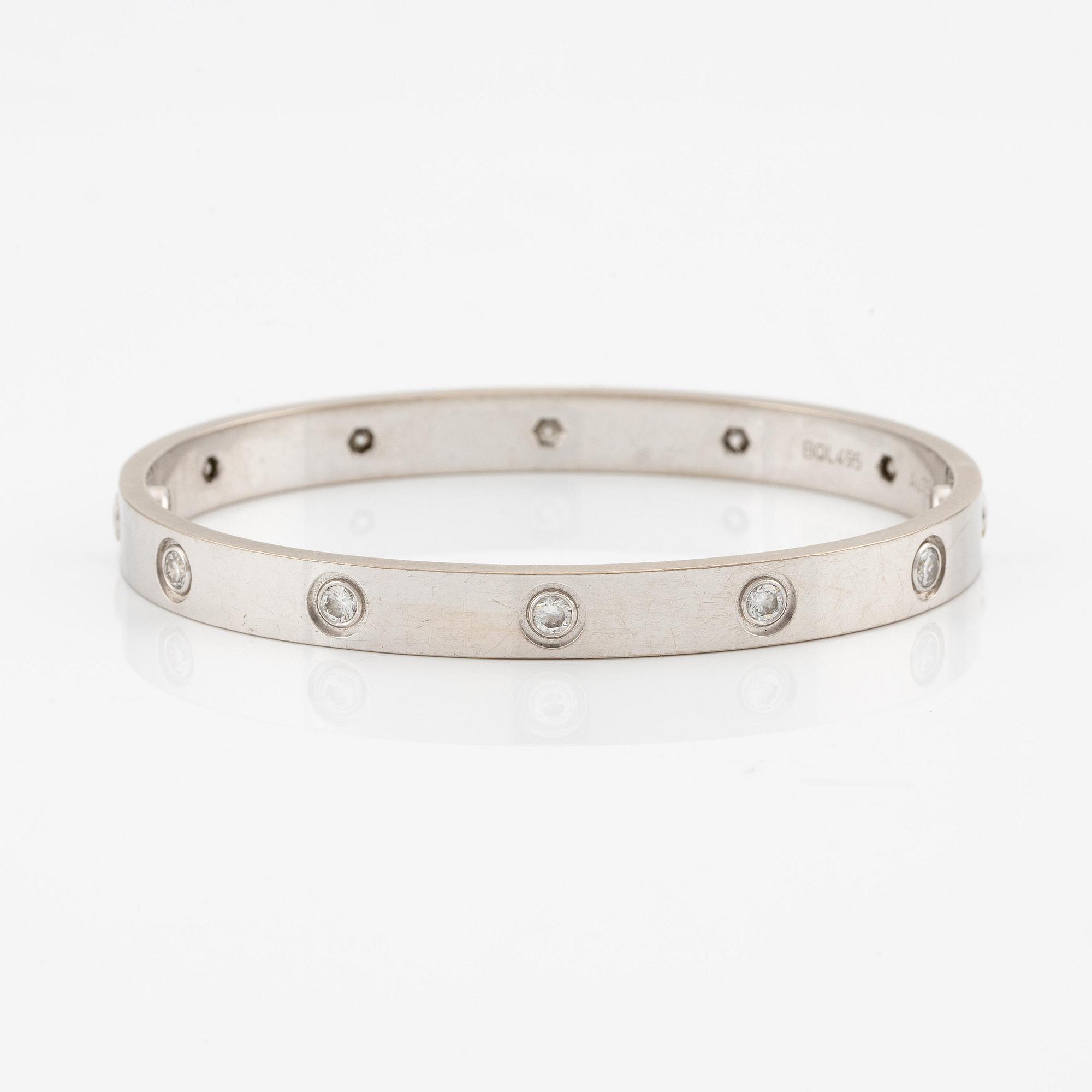 Cartier armband " Love" 18K vitguld med tio runda briljantslipade diamanter.