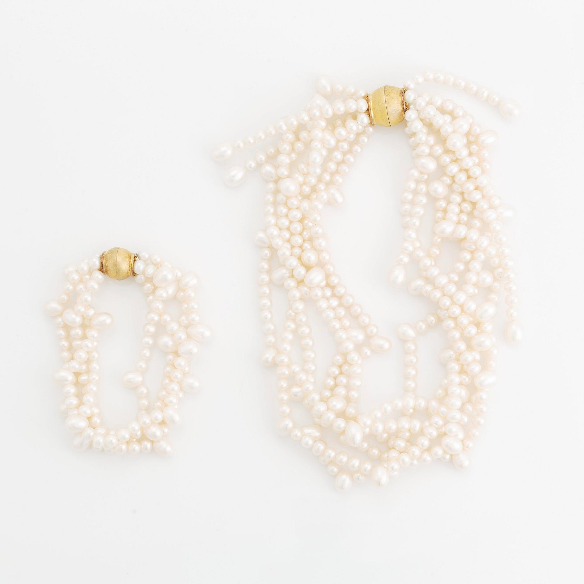 A cultured freshwater pearl necklace and bracelet.