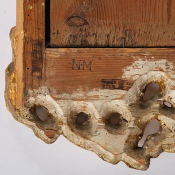 A rococo giltwood mirror by N. Meunier (master i Stockholm 1754-97).