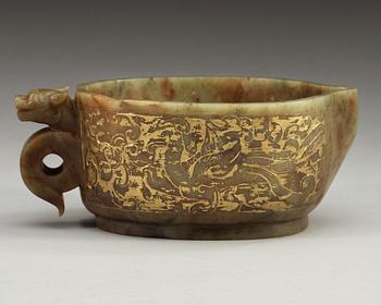 An archaistic carved and gilded vessel, Qing dynasty.