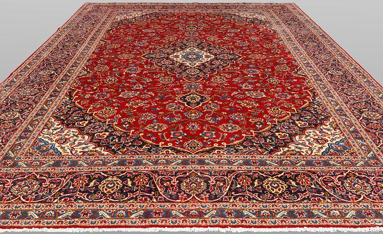 A Keshan carpet, 398 x 298 cm.