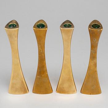 Four brass candle sticks by Karl Erik Ytterberg, 1960's.