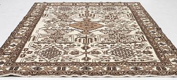 A Ferdos carpet, c. 295 x 210 cm.