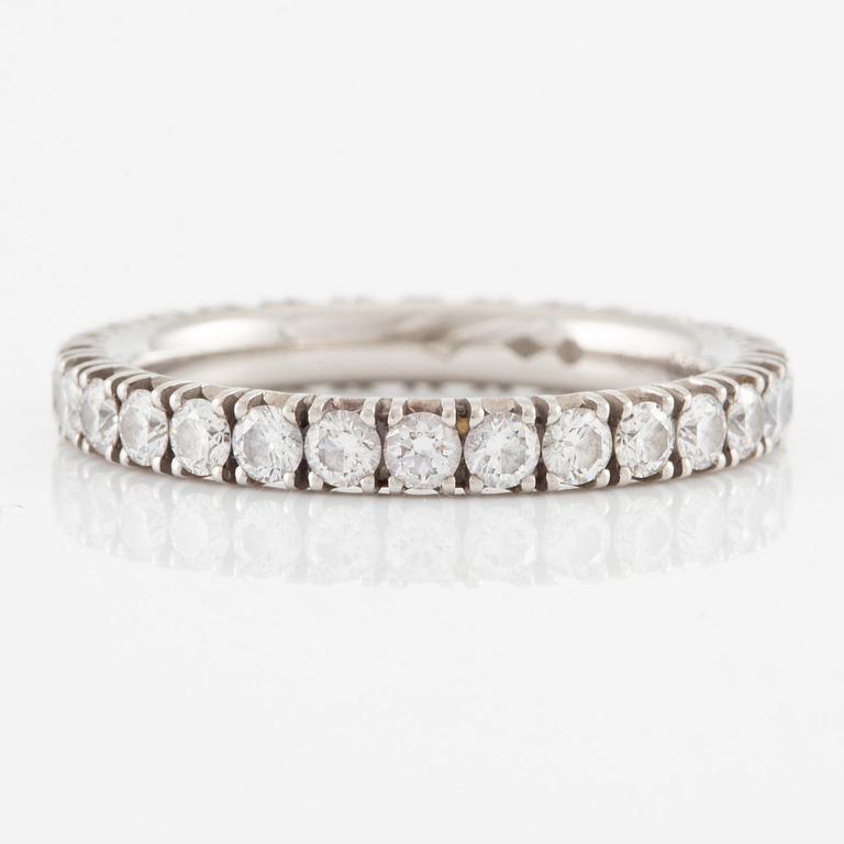 Cartier eternity ring in platinum with round brilliant-cut diamonds.