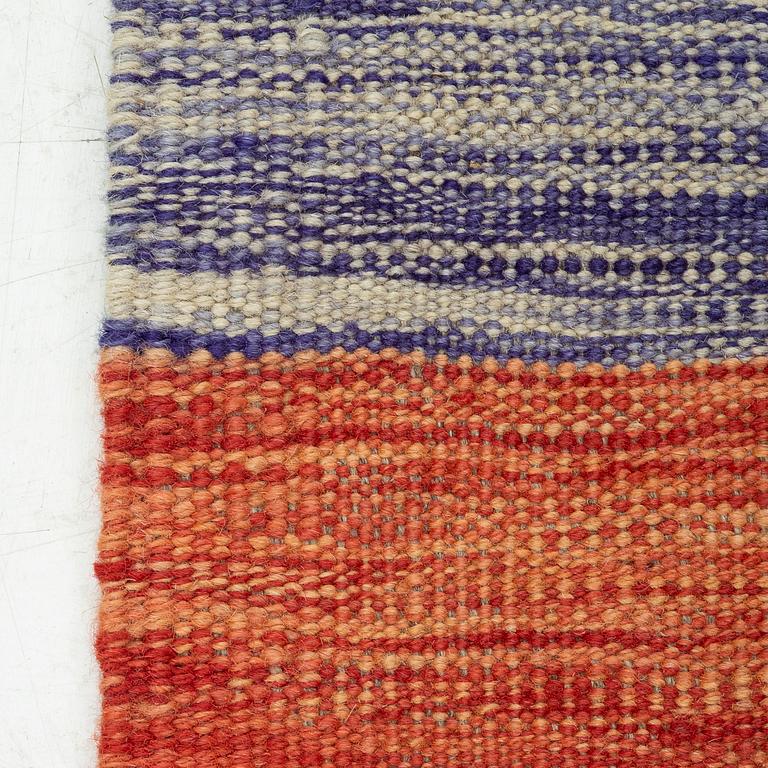 A kilim rug, ca 252 x 175 cm.