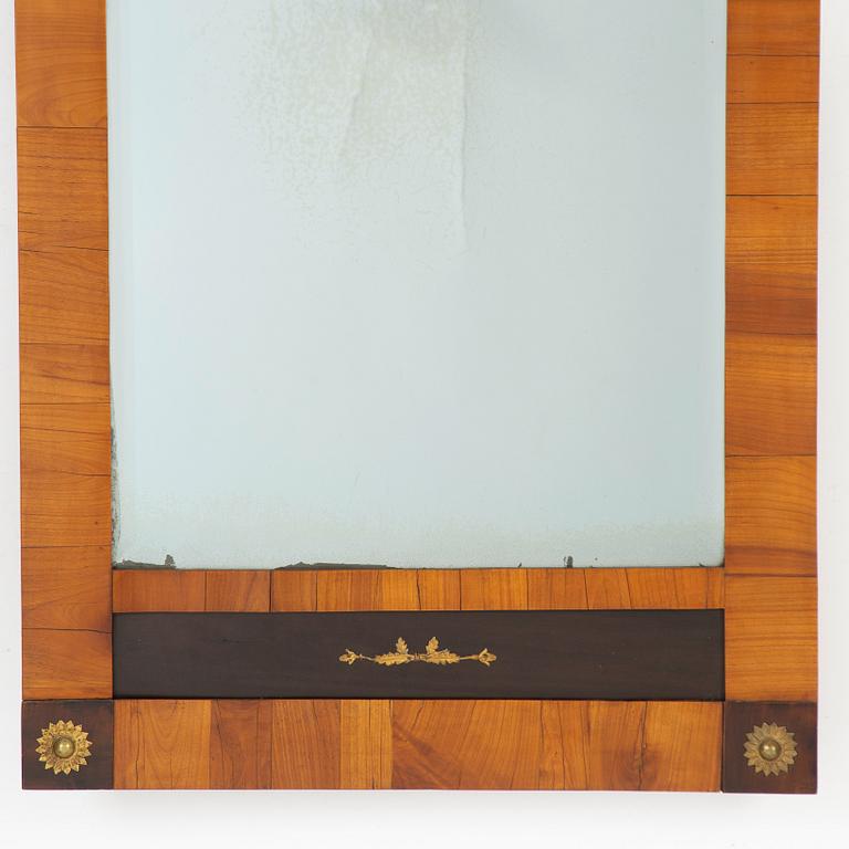 An Empire Mirror, first half of the 19th Century.