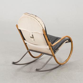 A PAUL TUTTLE ”NONNA” ROCKING CHAIR.