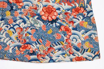 An embroidered red ground five clawed dragon 'female' formal robe, Qing dynasty, 19th century.