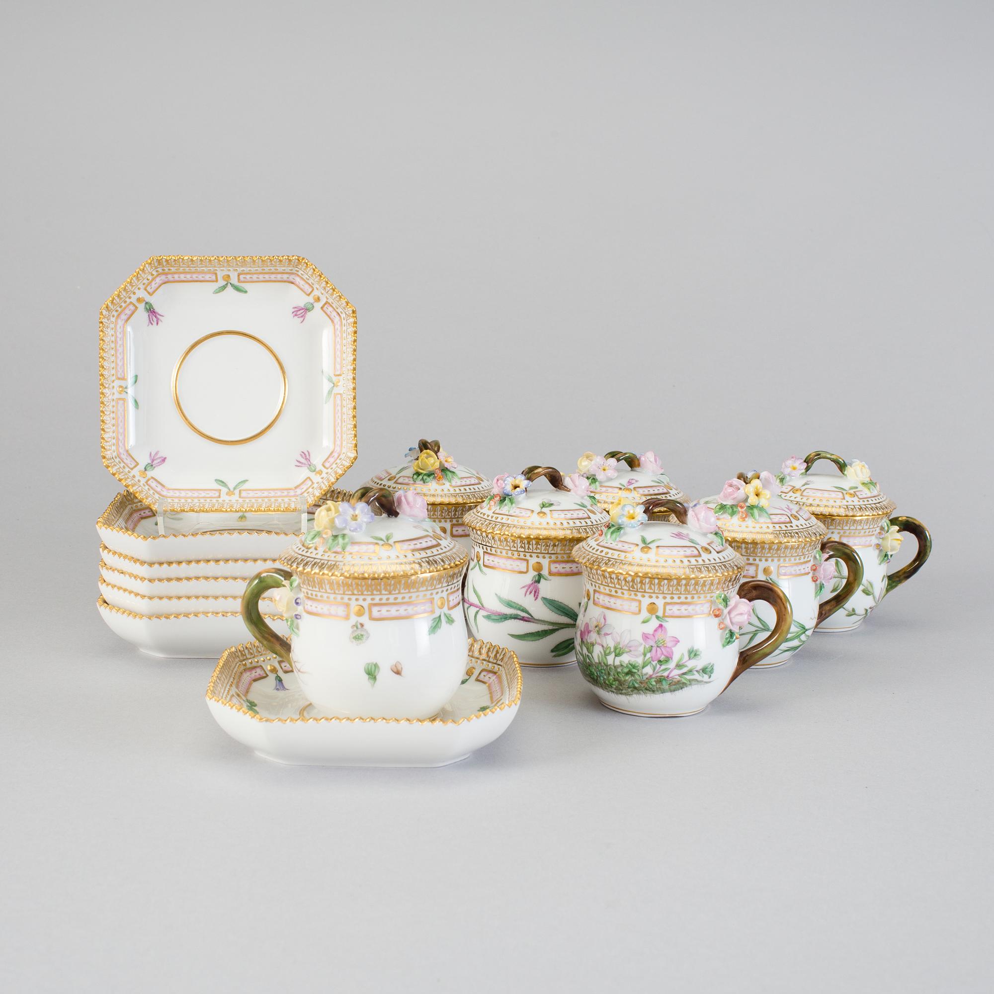 A set of seven Royal Copenhagen 'Flora Danica' custard cups with stands, 20th Century.