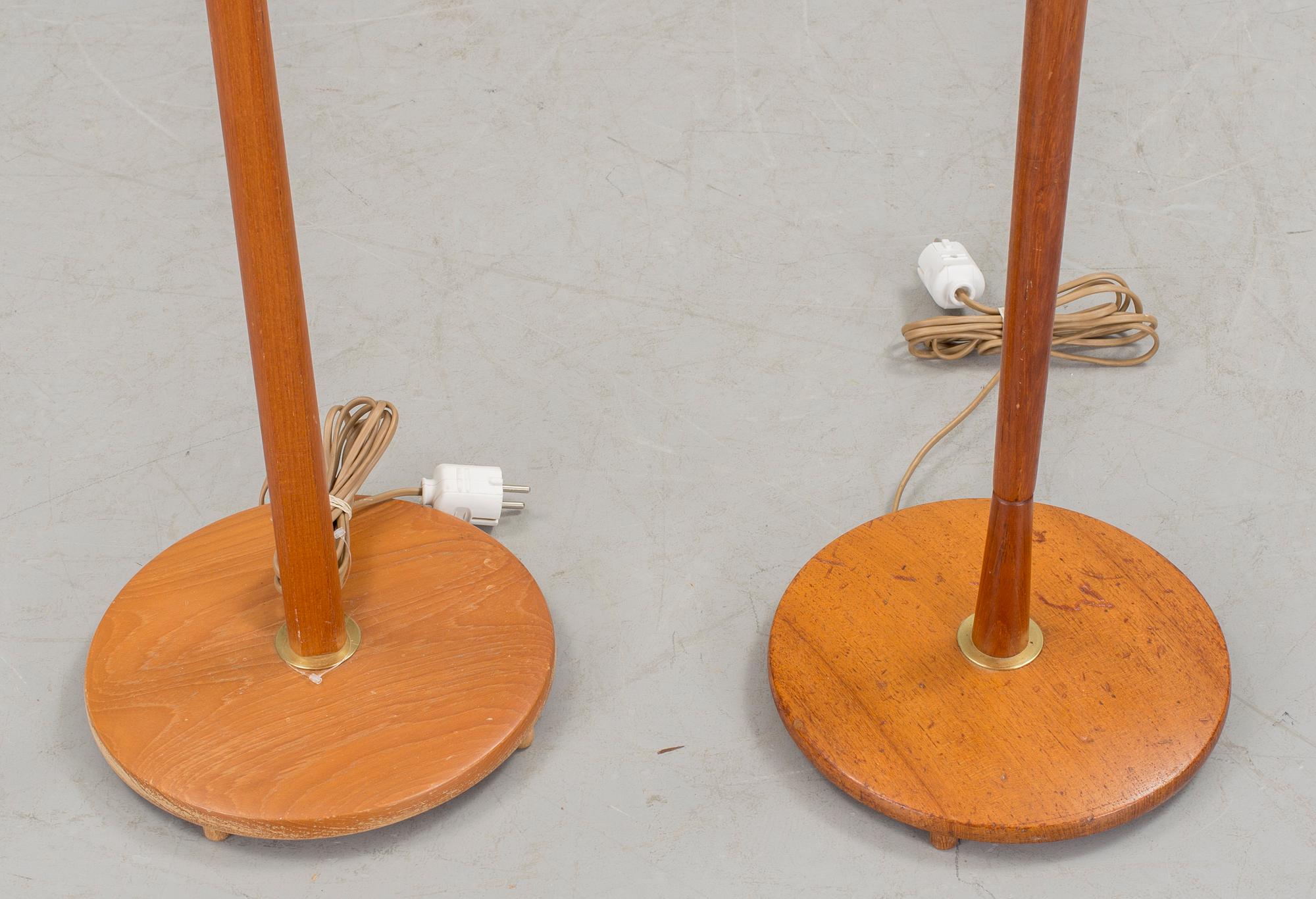 Two floor lamps in teak and brass from the 1960s/70s.