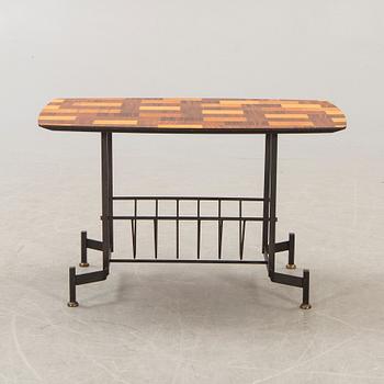 An Italian 1950s mahogany, walnut side table.