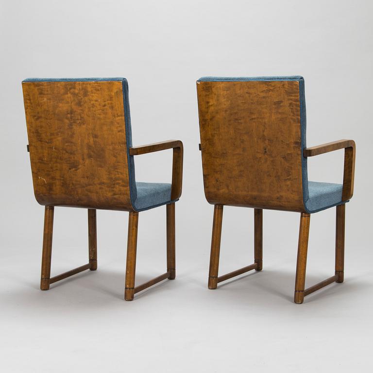 Eight 1930's open armchairs.