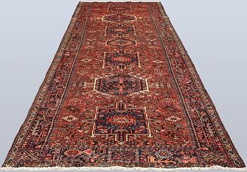 A semi-antique Garadje runner, approx. 425 x 148 cm.