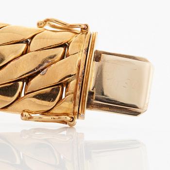 Bucherer armband 18K guld med runda briljantslipade diamanter.