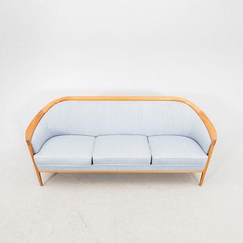 Bertil Fridhagen, a 1960s walnut sofa and armchair Bröderna Andersson.