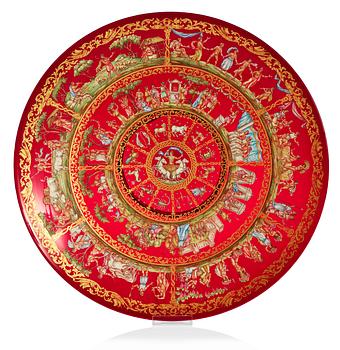 651. A large enamelled red glass charger, Italy/France, ca 1800.