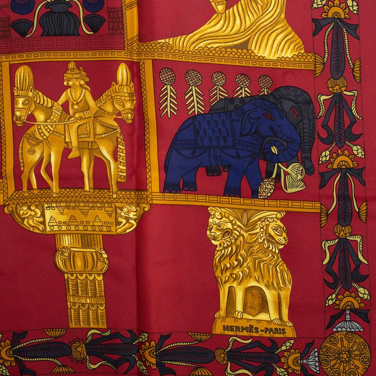 Hermès, a 'Torana' silk scarf.