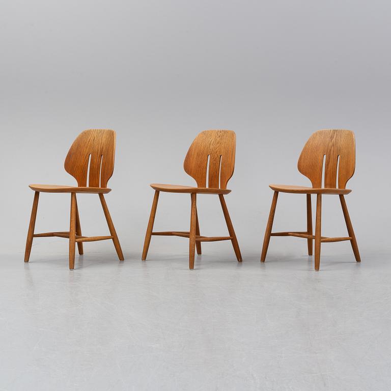 Three 'J 67' oak chairs by Ejvind A. Johansson, 1960's.