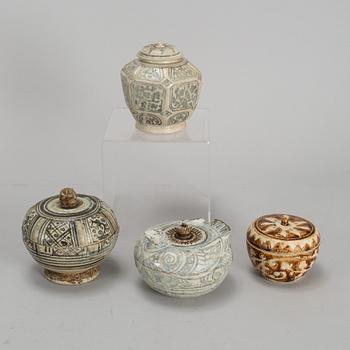 A group of four Swankhalok jars with covers, 16th/17th Century.