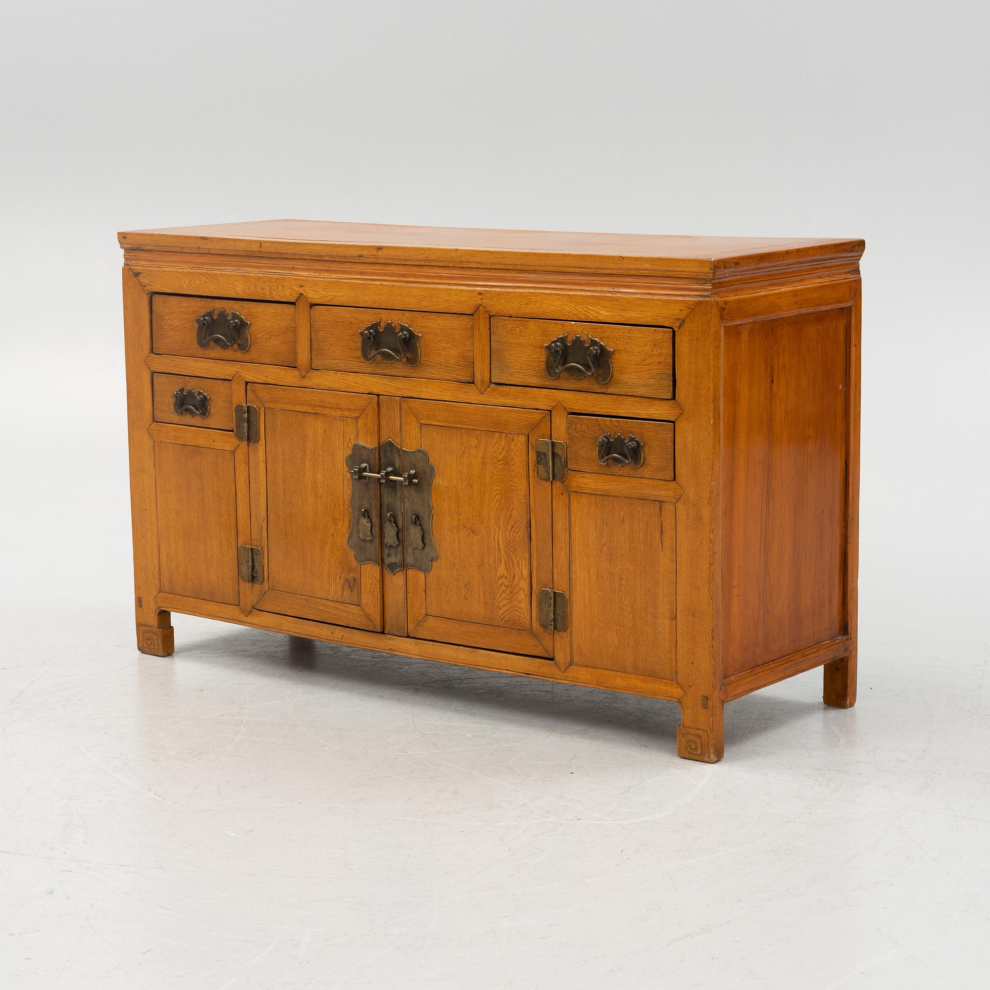 A hardwood sideboard, China, around 1900.