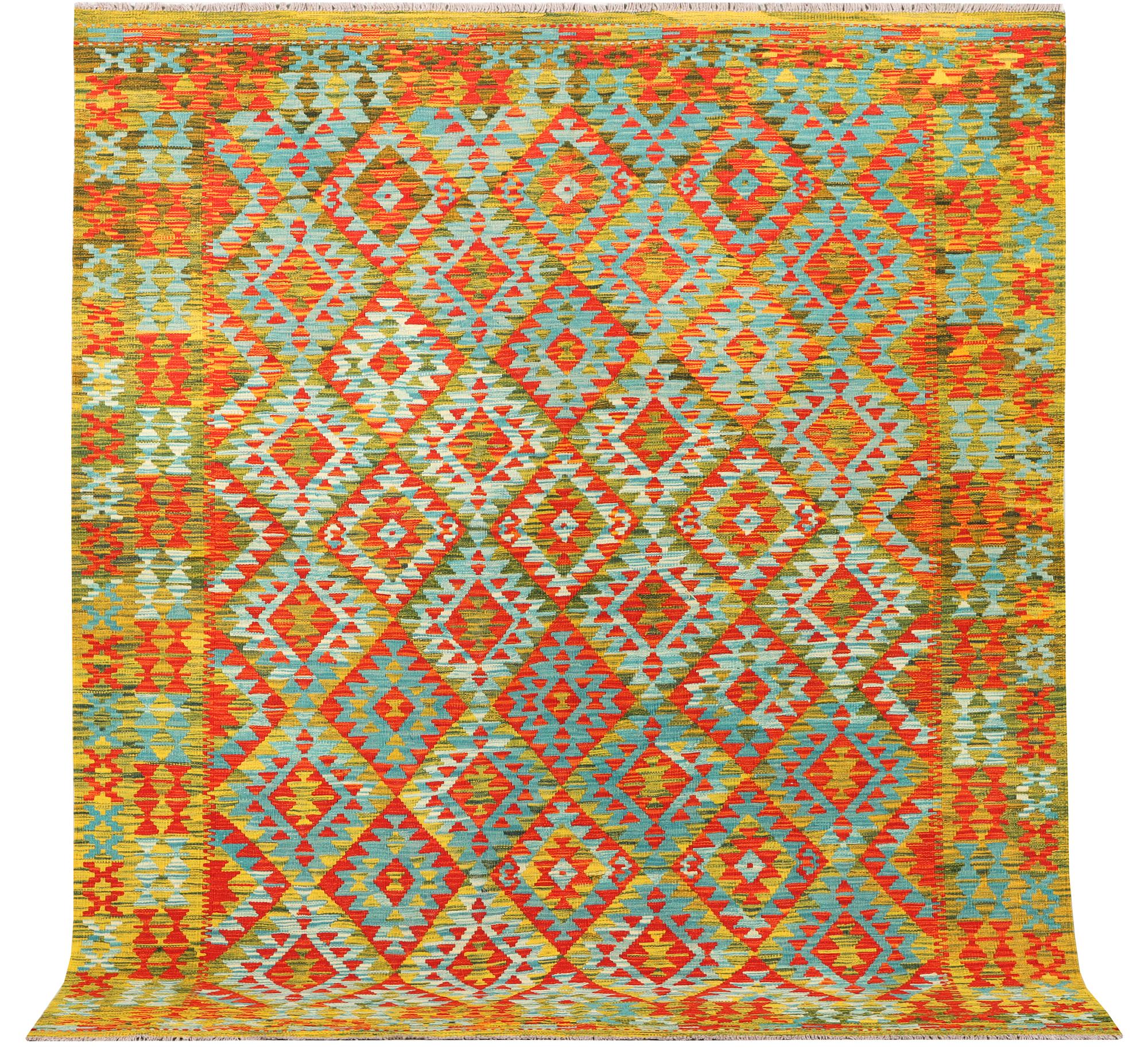 An Afghan Kelim carpet, c. 244 x 206 cm.