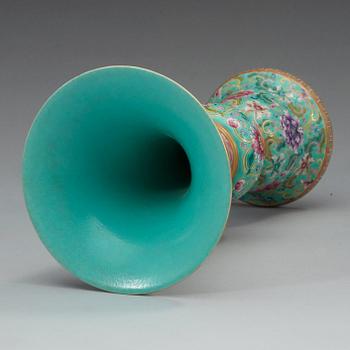 A famille rose against turquoise ground vase, 20th Century, with Qianlong mark.