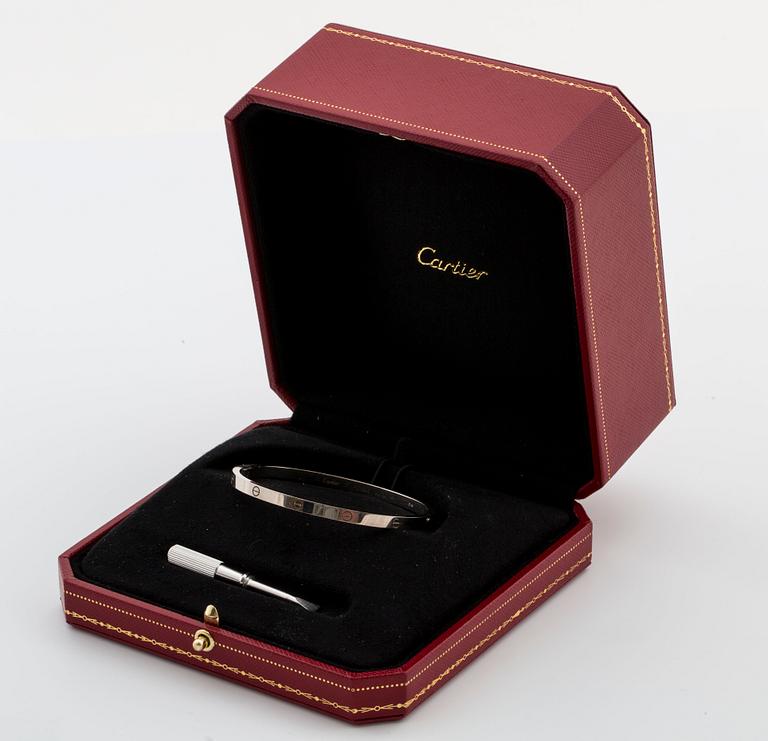 ARMRING, Cartier "Love bracelet" med tillhörande skruvmejsel. 18K vitguld.