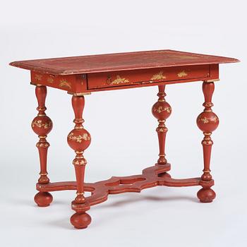 A late Baroque-style japanned table, 19th century.
