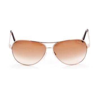 TOM FORD, a pair of gold colored sunglasses.