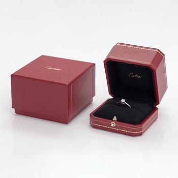 Cartier, a platinum ring with a diamond ca. 0.53 ct. Marked Cartier, FIK691 58. With certificate.