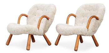 A pair of easy chairs, attributed to Philip Arctander, 1940's-50's.