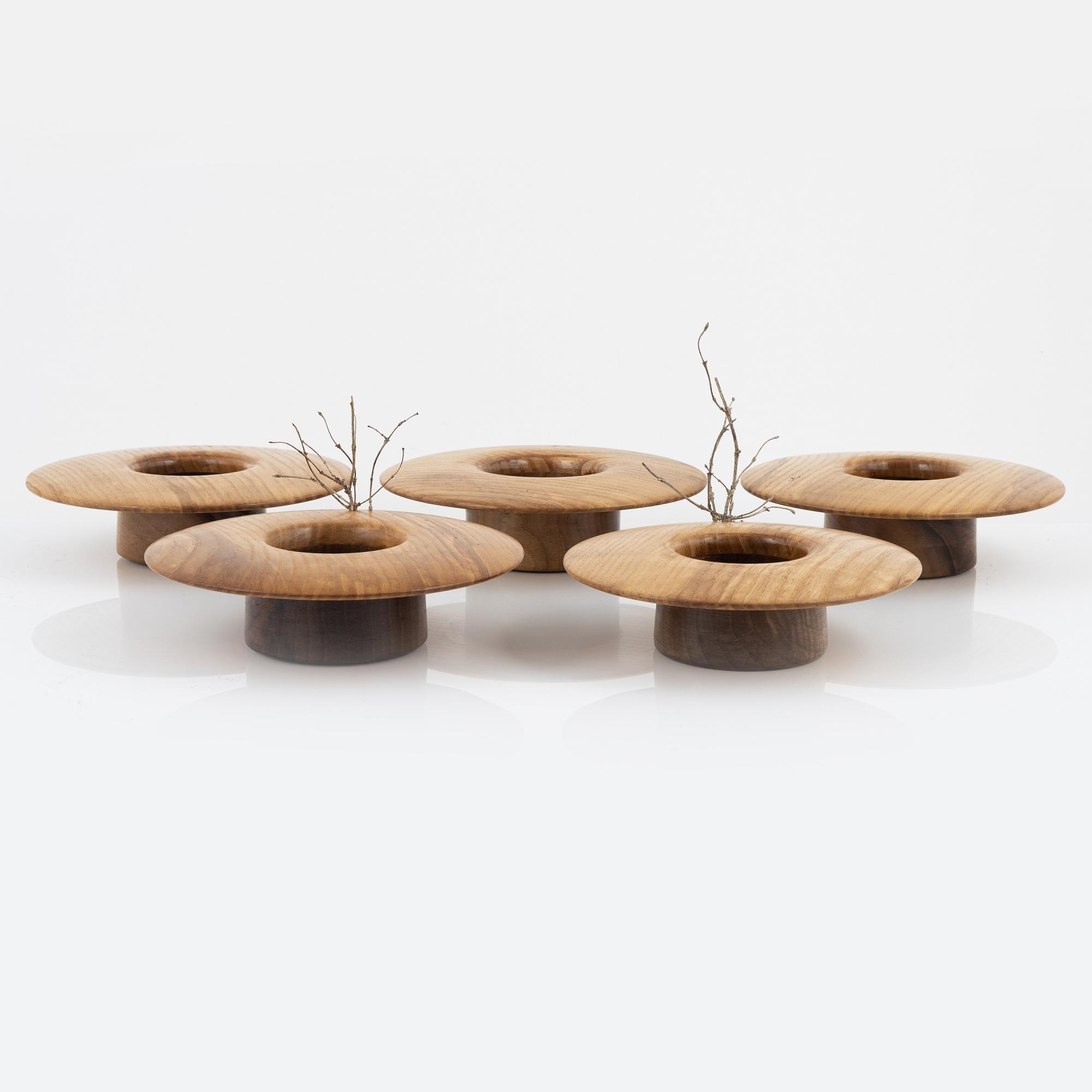 Magnus Ek, a set of five walnut and ash wood appetizer plates for Oaxen Krog.