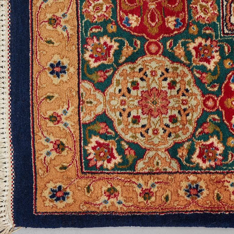 A CARPET, an old Tabriz, ca 403,5 x 298 cm (plus 1 cm  flat weave at one end).