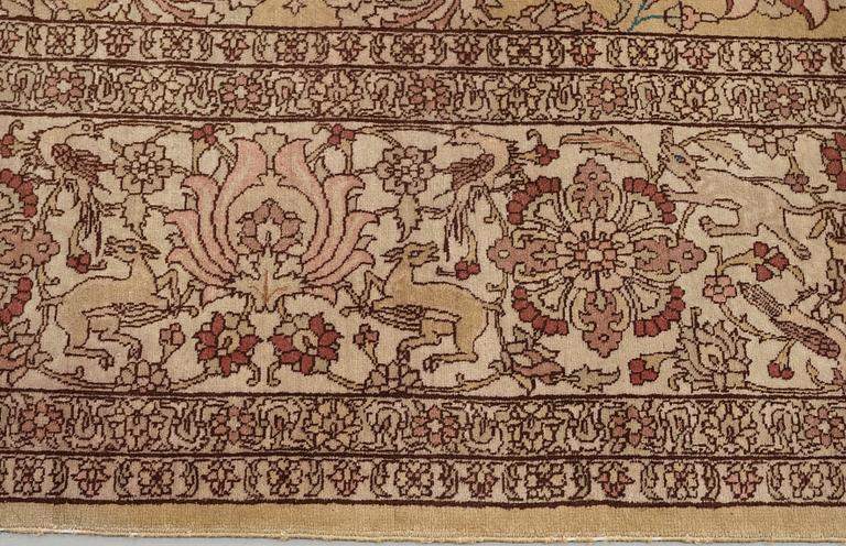 A CARPET, a semi-antique Tabriz Ghannadi, ca 424,5 x 321,5 cm.