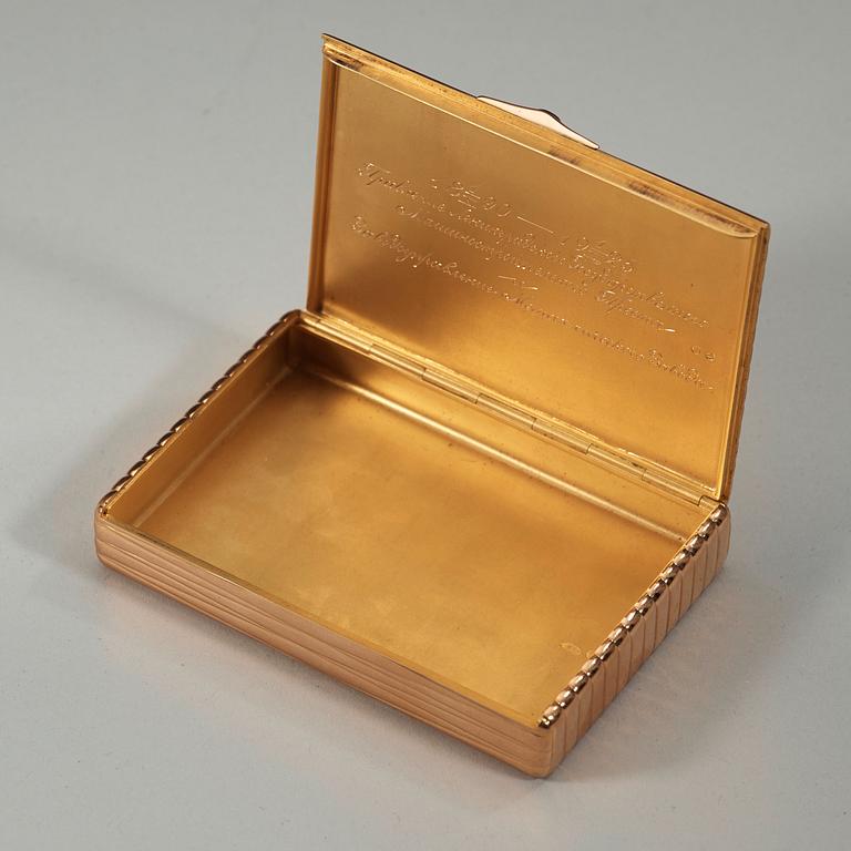 A Russian 20th century gold cigarette-case, unidentified makers mark, St. Petersburg 1908-1917.