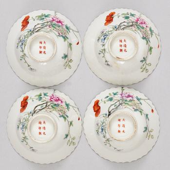 A set of four famille rose bowls, late Qing dynasty with Guangxus six character mark.