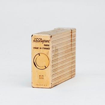 S T DUPONT, a gilded metal ligther.