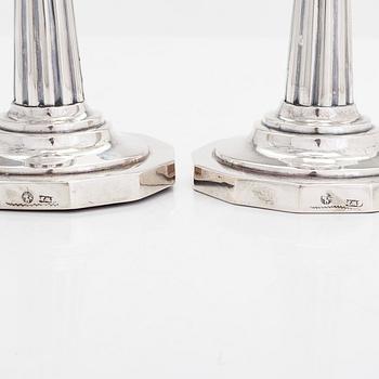 A pair of silver candlesticks, maker's mark of George Wilhelm Margraff (active in Berlin 1761 - 1804).