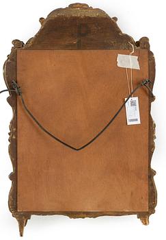 A 19th century Louis XV-style mirror.