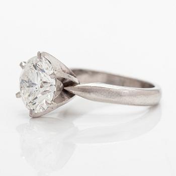 A platinum ring, with a brilliant-cut diamond approximately 3.10 ct. Domino Jewellery, Birmingham, England.