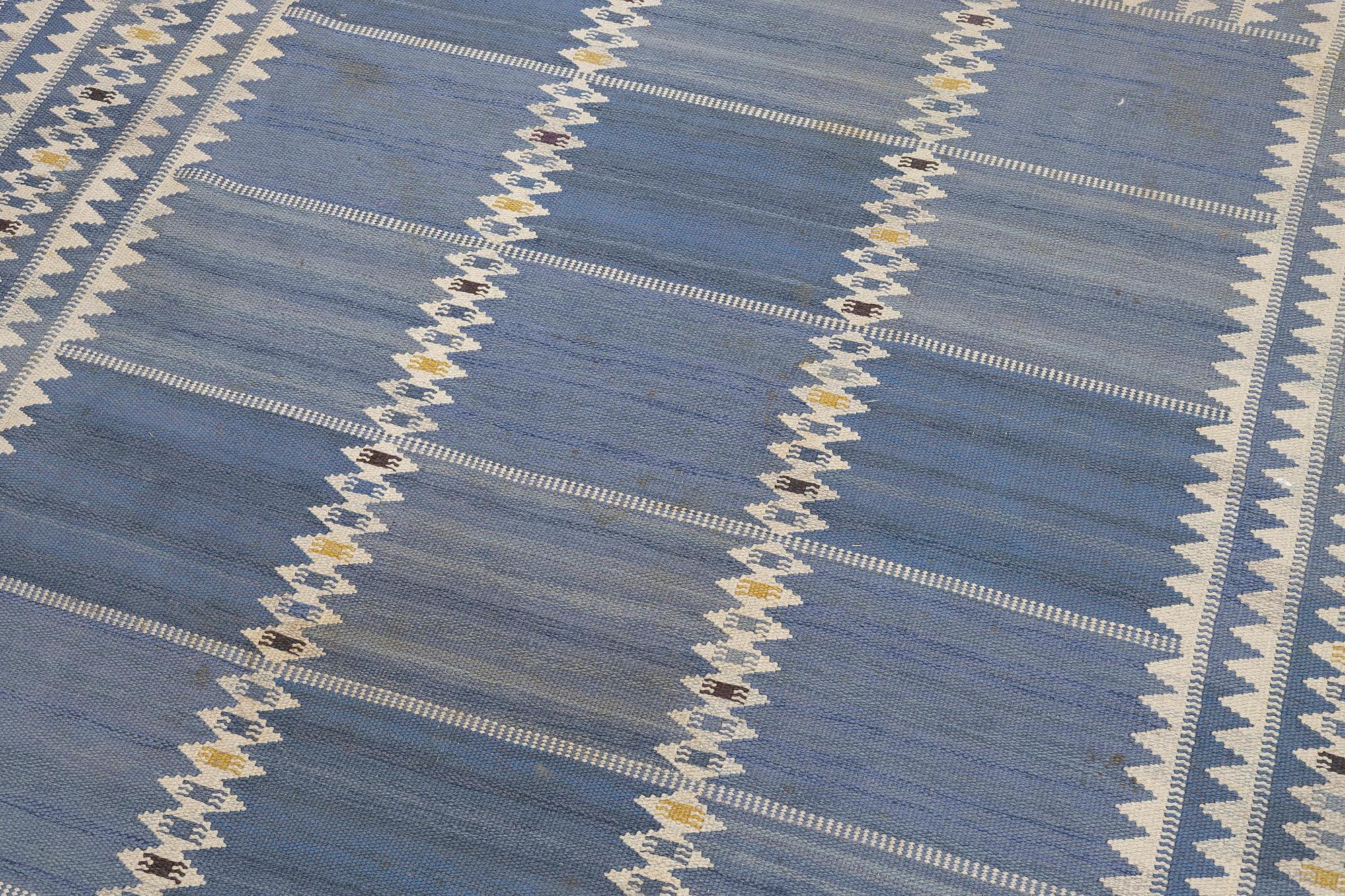 Barbro Nilsson, a carpet, "Salerno blå", flat weave, c. 314 x 255 cm, signed AB MMF BN.