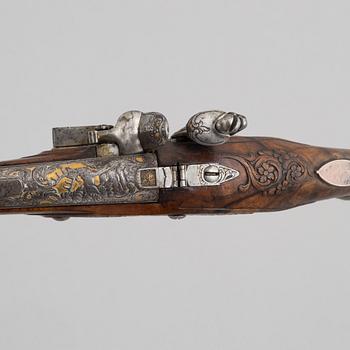 A Pair of flintlock pistols, by Johann Jacob Kuchenreuter, (Regensburg 1709-1783, Royal gunsmith).
