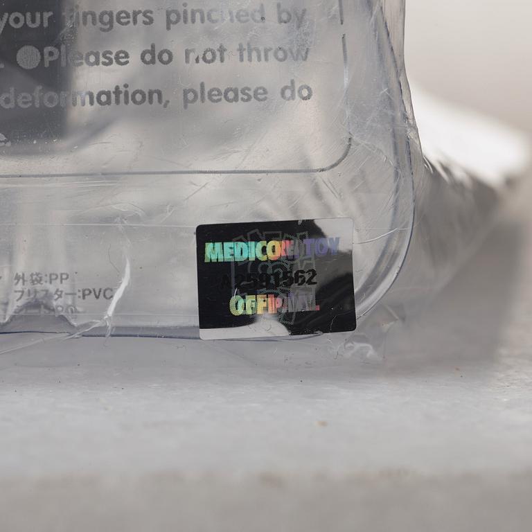 KAWS, "Small Lie" (black, grey, brown).