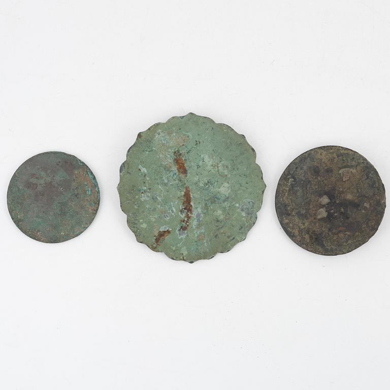 A set of three bronze mirrors, Han dynasty and later.