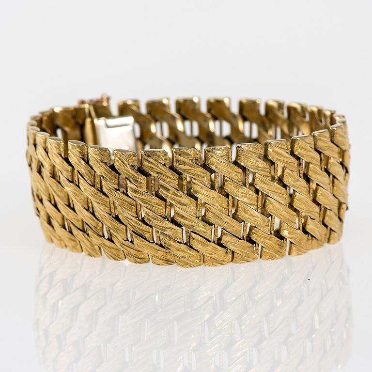ARMBAND, 18K guld. Helsingfors 1965. Vikt ca 77,8 g.