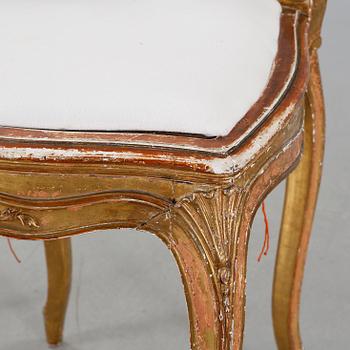 A pair of chairs from the first half of the 20th century.