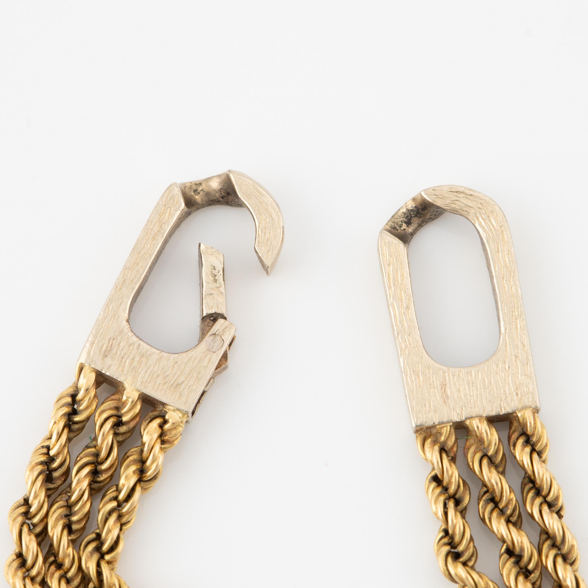 Bracelet in 18K gold with octagon-cut diamonds.