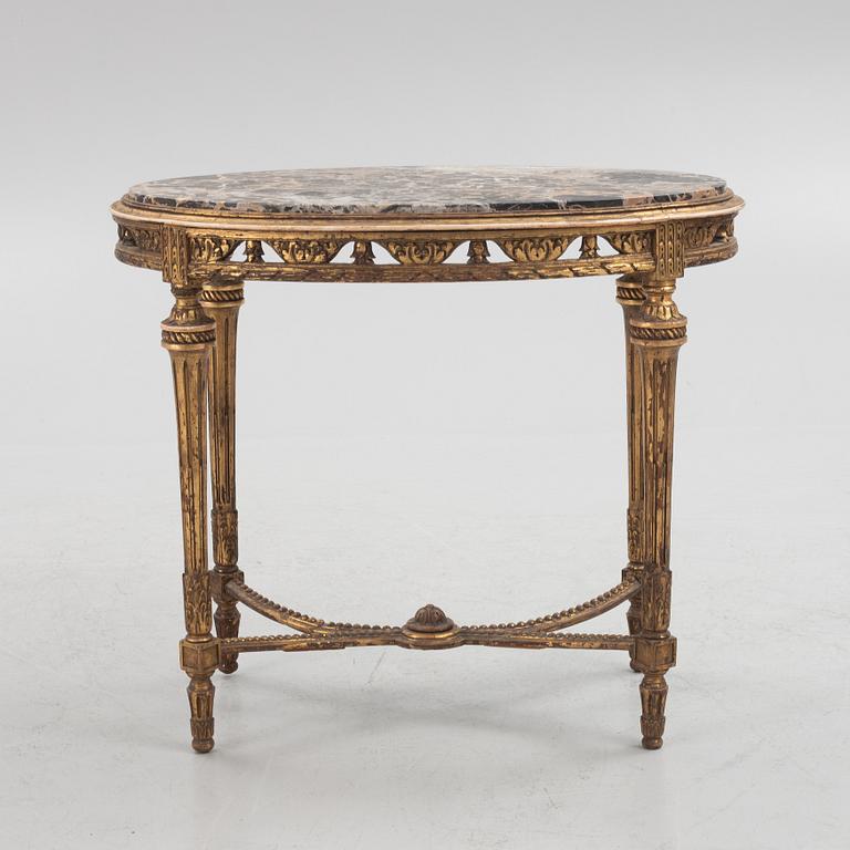 A Louis XVI-style table, circa 1900.